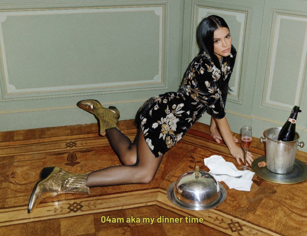 Bruna Marquezine sitting on the floor with dinner. Yellow caption: 04am aka my dinner time.